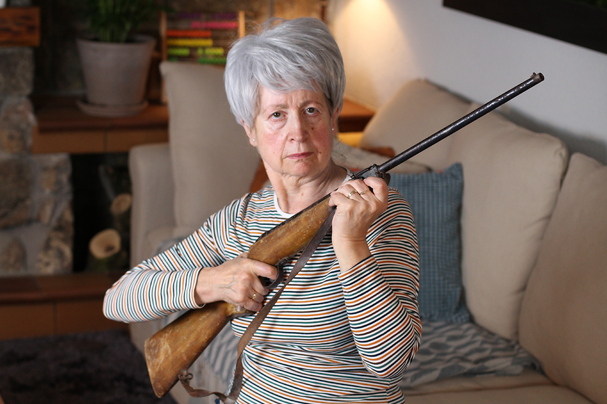 Murder Defense - Texas - Woman Holding Rifle