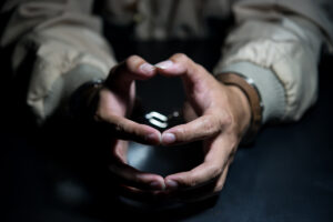 Man in jail contemplating freedom