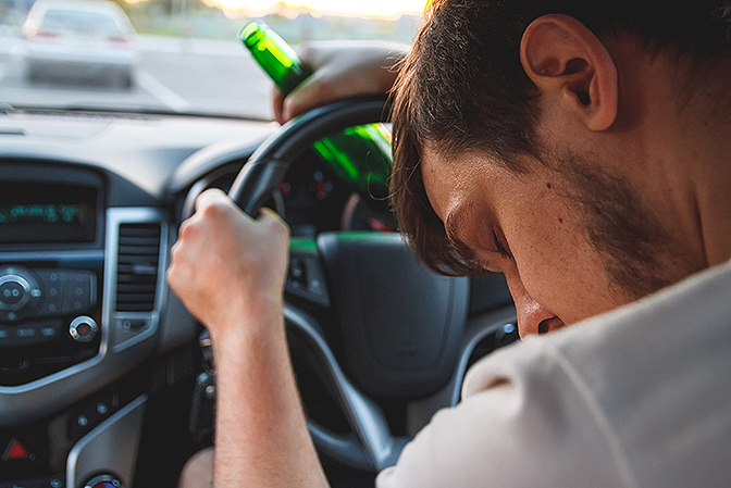 a person driving while intoxicated